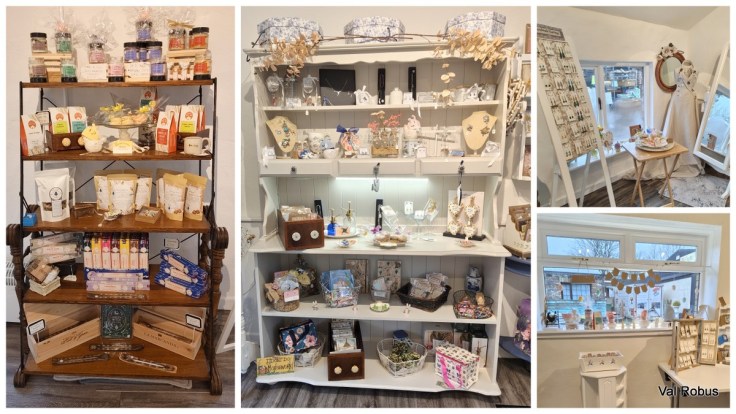 A display of various artisanal products including jars, bags, and decorative items on wooden shelves in a boutique setting.