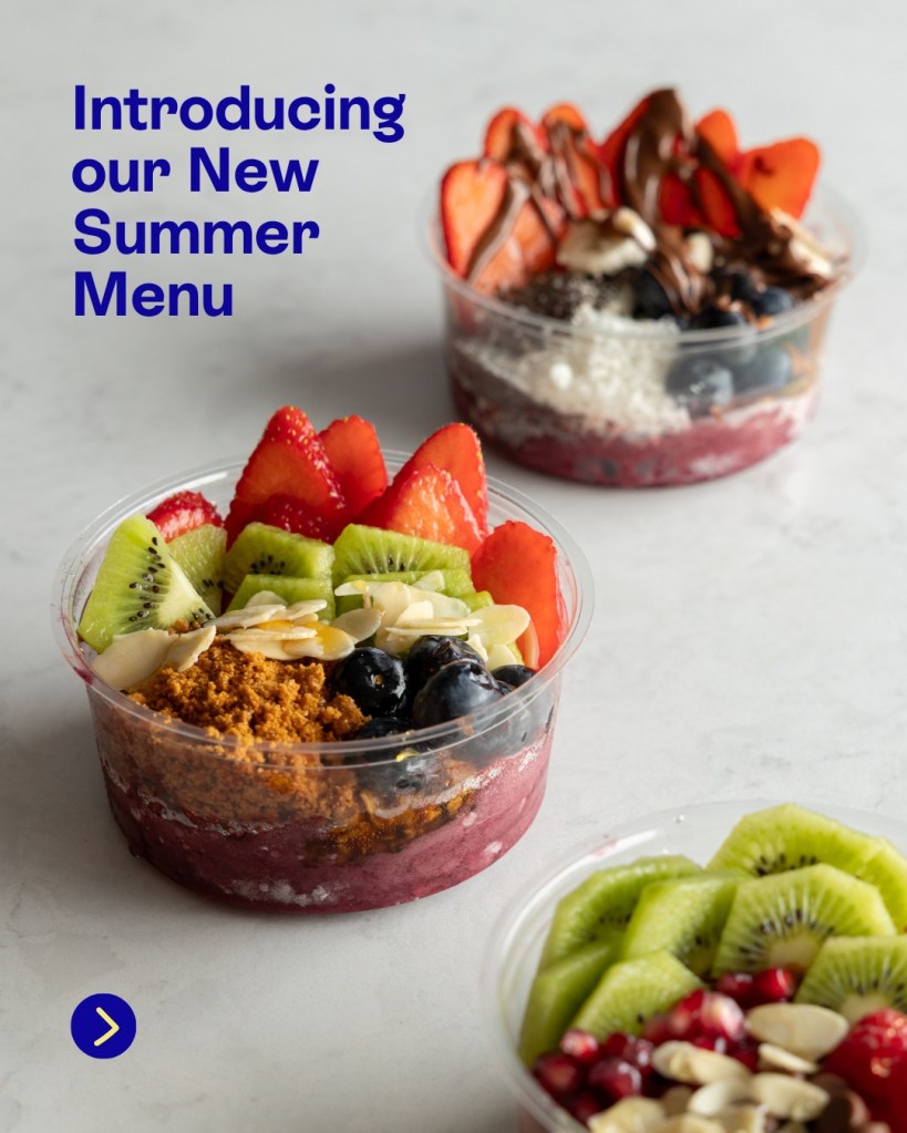 A colorful display of summer menu items in clear cups, featuring layers of fruits such as strawberries, kiwis, and blueberries, topped with almonds and a sprinkle of granola. The text 'Introducing our New Summer Menu' is prominently featured.